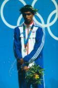 Boxing Amir Khan signed 12x8 inch colour photo pictured during the Olympic Games. Good condition