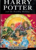 Harry Potter and the Deathly hallows hardback book by J K Rowling. We combine shipping on all