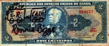 Ronnie Biggs, a signed Brazilian two cruzeiros note with a doodle of a train added by Biggs. An