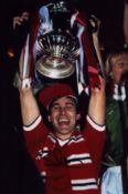 Bryan Robson signed 12x8 inch colour photo pictured lifting the FA cup wile captain of Manchester