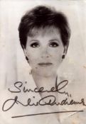 Julie Andrews signed 7x5 inch black and white photo slightly marked signature not affected. Good