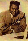 Fats Domino signed vintage 7x5 inch sepia photo. Good condition. All autographs come with a