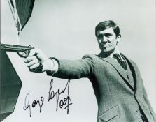 George Lazenby signed 10x8 inch Jame Bond black and white photo. Good condition. All autographs come
