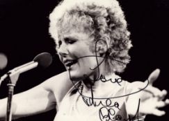 Petula Clark signed 9x7 inch black and white photo. Good condition. All autographs come with a