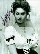Sophia Loren signed 8x6 inch black and white photo. Good condition. All autographs come with a