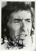 Jackie Stewart signed 7x5 inch black and white photo. Good condition. All autographs come with a