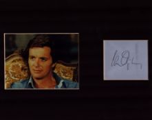 Ian Ogilvy signed card mounted with unsigned colour photo 10x8 inch overall. Good condition. All
