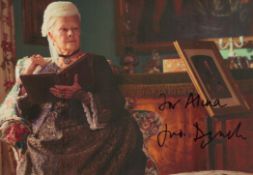 Judi Dench, actress. A signed and dedicated 11x8 inch photo as 'Victoria' from the film, Victoria