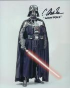 Star Wars 8 x 10 inch colour light sabre wielding photo signed by Darth Vader body actor C Andrew