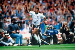 Autographed JOHN BARNES 12 x 8 photo : Col, depicting JOHN BARNES running away in celebration