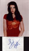 Liv Tyler signed 6x4 inch page with 10x8 inch unsigned colour photo. Good condition. All