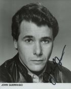 John Guerrasio signed 10x8inch black and white photo. Good condition. All autographs come with a
