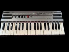 Bontempi Music Partner MS40 Keyboard Piano, 1980s in original box. Bos shows signs of age. Single
