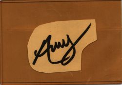 Amy Winehouse signed 4x3 inch irregular cut album page. Good condition Est.