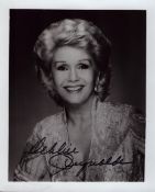 Debbie Reynolds signed 5x4 inch black and white photo. Good condition Est.