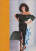 Dame Joan Collins DBE signed magazine page. Good condition Est.