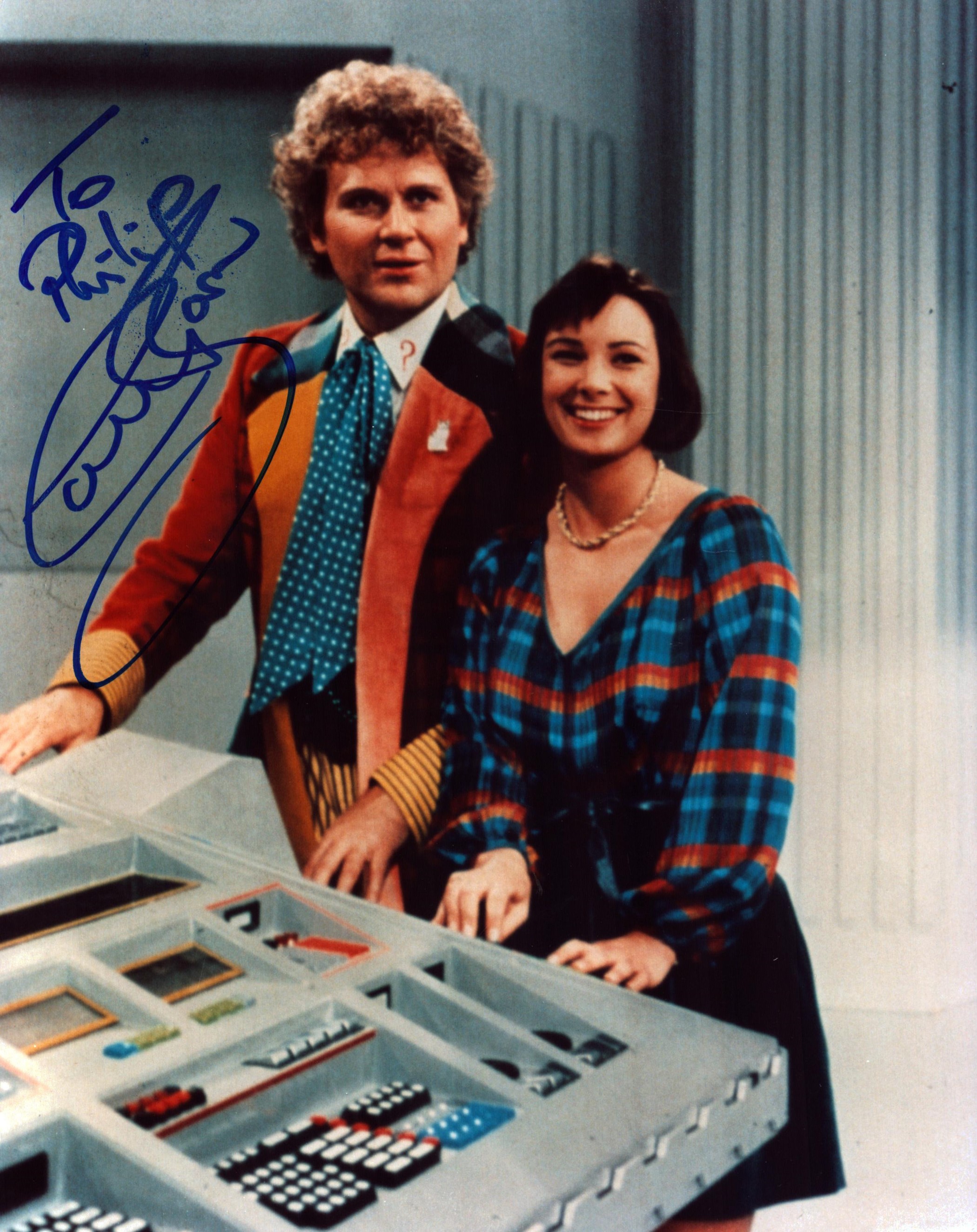 Dr Who Colin Baker signed 10 x 8 inch colour photo to Phillip. Good condition Est.