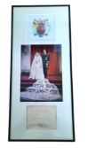 Queen Elizabeth II and Duke of Edinburgh signature piece. Mounted and framed below colour photo of