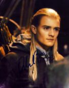 Orlando Bloom signed 10x8 inch Lord of the Rings colour photo. Good condition. All autographs come