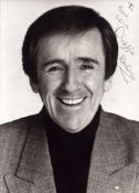 Duggie Brown signed 7x5 inch black and white photo. Good condition. All autographs come with a