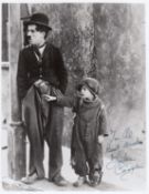 Autographed 10 x 8 Photo - JACKIE COOGAN / THE KID : A superb 10 x 8 photograph depicting a scene