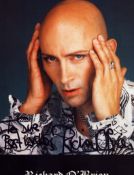Richard O'Brien signed 8x6 inch colour photo. Dedicated. Good condition. All autographs come with