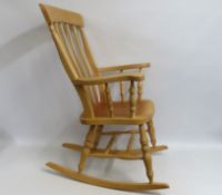 A beech rocking chair, approx. 1110mm high to back