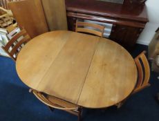 A Danish mid century oak extending table by C. J. Rosengaard with three inserts, total length fully