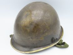 A WW2 US military M1 helmet
