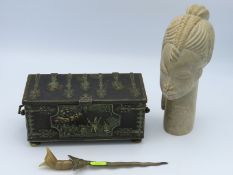 A decorative cast bronze style box with embossed m