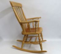 A beech rocking chair, approx. 1110mm high to back