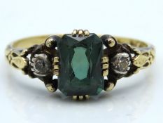 A Swedish 18ct gold ring set with diamond & tourma