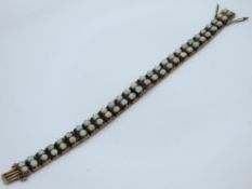 A gold plated bracelet set with opal, 180mm long,