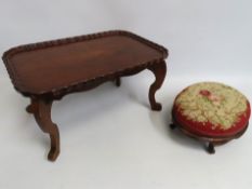An antique mahogany bed tray with fold out legs, 6