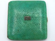 A white metal shagreen cigarette case with gilded