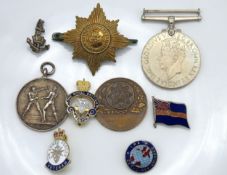 A WW2 medal awarded to L/Sgt. Peter Powley twinned