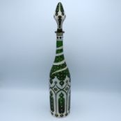 A 19thC. Bohemian overlay glass decanter with stop