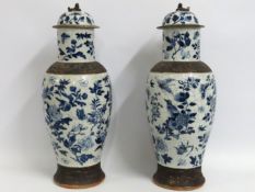 A pair of large 19thC. Chinese blue & white lidded