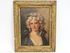 A framed 19thC. oil on canvas portrait of young wo