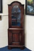 A late 19thC. walnut corner cabinet, 1870mm tall x