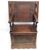 A small oak monks bench, ideal for cottage, split