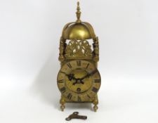 A 19thC. brass lantern clock, not running, 295mm tall. Once belonged to owner of Rock Towers Hotel i