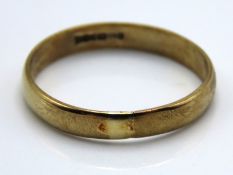 A 9ct gold band, resized, 2.1g, size U