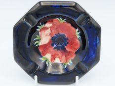 A Moorcroft pottery poppy ashtray, 108mm diameter