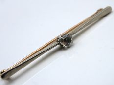 A 9ct gold & platinum bar brooch set with paste st