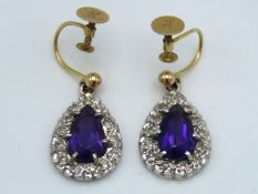 A pair of 9ct gold screw back pear shaped earrings