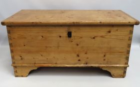 A 19thC. pine coffer with candle box, 1150mm x 560