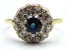 An 18ct gold ring set with diamond & sapphire, 3.3