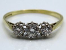 An antique 18ct gold trilogy ring set with approx.