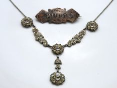 A silver brooch 'Milly' twinned with a decorative